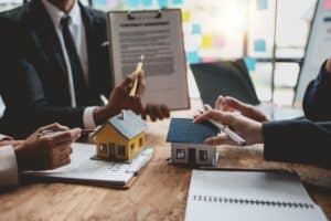 Business people meeting together about real estate. Working as a teamwork of real estate businesses.