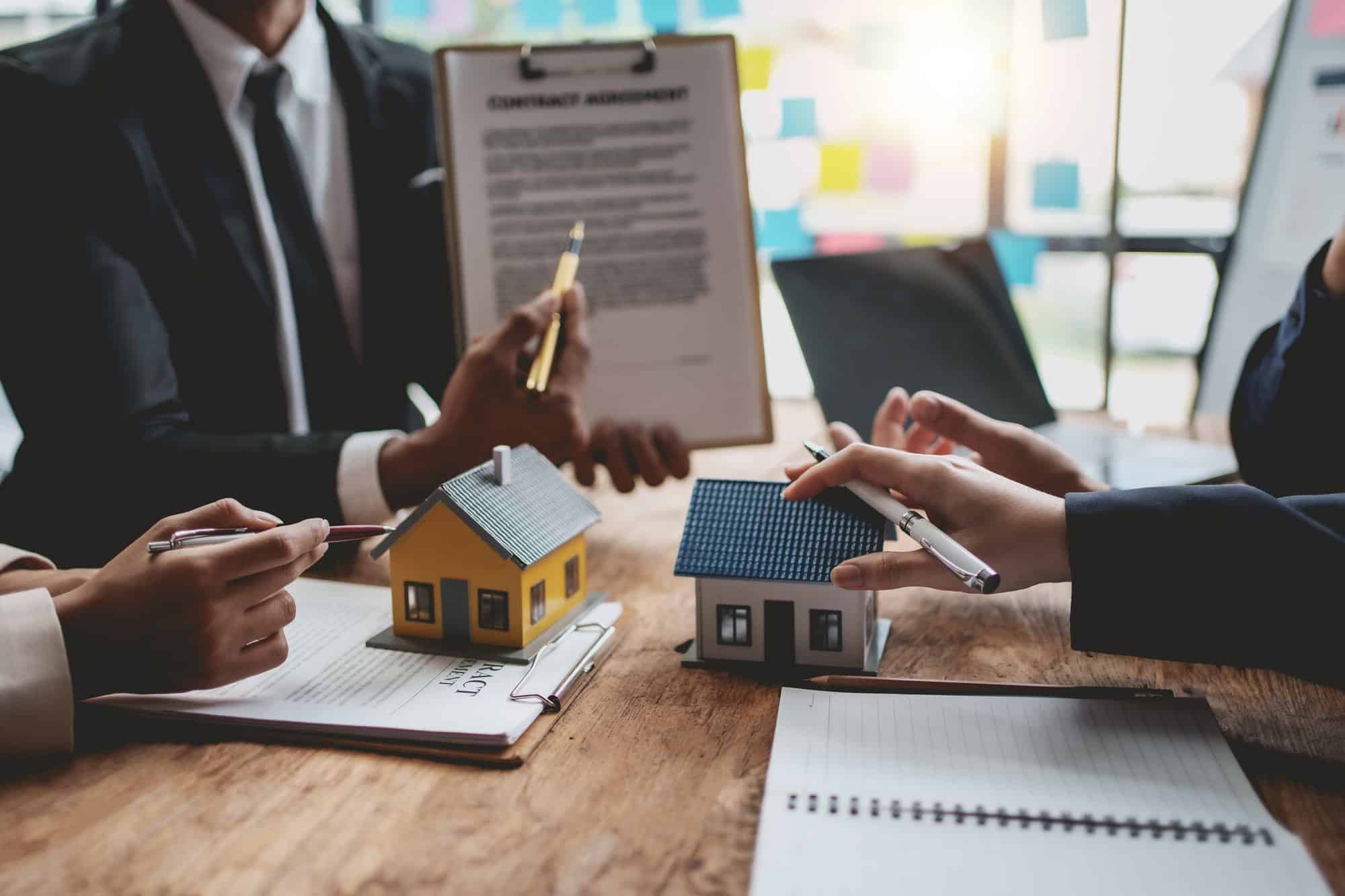 Business people meeting together about real estate. Working as a teamwork of real estate businesses.